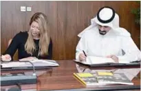  ??  ?? KUWAIT: Director General of KDIPA Sheikh Meshaal Jaber Al-Ahmad Al-Sabah and OBG’s Country Director Jennifer Poole during the signing of the MoU.