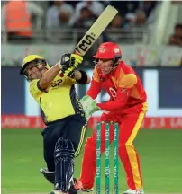  ?? Photo by M Sajjad ?? Akmal’s 88 for Peshawar Zalmi on Thursday night came in a losing cause after Islamabad won the opening clash. —