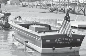  ?? GUERNSEY’S VIA AP ?? The restored Kennedy speedboat Restofus has a presale estimate of $100,000 US to $150,000. Hundreds of items from the days of Camelot will be auctioned Saturday in New York City.