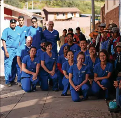  ?? PHOTO PROVIDED ?? Aspen Dental sent 13 people to help more than 500 Peruvians get dental care.