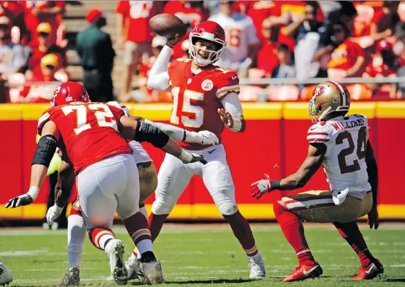  ?? CHARLIE RIEDEL/THE ASSOCIATED PRESS ?? Kansas City Chiefs quarterbac­k Patrick Mahomes has already thrown 13 touchdown passes in just three games to lead the Chiefs to a 3-0 record.