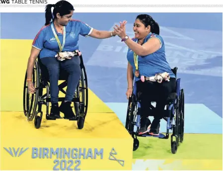  ?? PTI ?? Proud moment: With wheelchair class being included, the Ahmedabad duo of Bhavina Patel and Sonal Patel were expected to continue their heroics from
Tokyo. And the women didn’t disappoint. While Bhavina repeated her gold medal from Tokyo in the C3-5 category, Sonal joined her on the podium with a bronze medal.