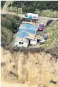  ??  ?? Wild weather at the weekend led to the evacuation of 13 homes in Hemsby, Norfolk, as part of the clifftop gave way.