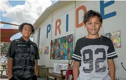  ?? PHOTO: MURRAY WILSON/STUFF ?? Kanye Maxwell-watson, 11, left, and Andre Tiweka, 12, love learning about their Ma¯ori heritage, successful Ma¯ori role models and taiaha training in the Tama Toa programme.