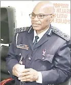  ?? (Pic: Timothy Simelane) ?? NATCOM Tsitsibala Dlamini lighting a candle at the Police Headquarte­rs during the Police Wellness (World Aids) Day Commemorat­ion yesterday.