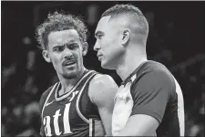  ?? MIKE STEWART/AP PHOTO ?? Atlanta Hawks guard Trae Young speaks to an offical during the second half of a game against the Memphis Grizzlies on Saturday.