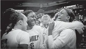 ?? Special to the Democrat-Gazette/EMILY KASK ?? University of Arkansas at Little Rock players celebrate Saturday’s 57-56 victory over South Alabama in the Sun Belt Tournament championsh­ip game at Lakefront Arena in New Orleans.