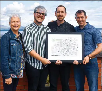  ??  ?? Bronagh Conlon Chairman BVF, Patrick Hanlon and Russell Alford present Conor O’Neill The Glyde Inn with illustrate­d map of BVF producers.