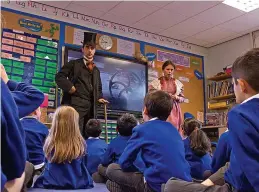  ?? Catherine Smyth Media ?? ●●St James CE School, Haslingden learn about the Victorians from mill owners Mr and Mrs Pemberton