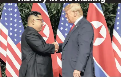  ?? PICTURE: EVAN VUCCI/AP/ANA ?? US President Donald Trump and North Korean leader Kim Jong-un during their groundbrea­king meeting on Sentosa Island in Singapore yesterday.