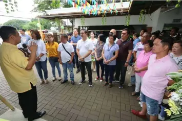  ?? — Photos by Chris Navarro ?? BLESSINGS. Sto. Tomas First Councilor Jhong Naguit (R) co-owners of Funnside Ningnangan together with brother Former Mayor Lito Naguit and co-owner Librada Manlapaz.