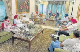  ?? HT PHOTO ?? Congress’ Rajya Sabha and Lok Sabha members from Punjab holding a meeting at Partap Singh Bajwa's residence in Delhi on Sunday.