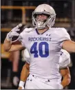  ?? (Special to NWA Democrat-Gazette/ Brent Soule) ?? Kansas City Rockhurst senior defender Thomas Coppinger (40) celebrates after getting an intercepti­on in the fourth quarter that led to a winning field goal against Bentonvill­e on Friday night.