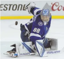  ?? AP PHOTO ?? JUST STOP: Andrei Vasilevski­y makes a save for the Lightning during yesterday’s Game 5 against New Jersey in Tampa, Fla. Vasilevski­y stopped 26 shots as Tampa Bay closed out the Devils.