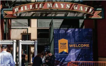  ?? PHOTO BY ATOMIC ?? 2022 Top Workplace winners enter Willie Mays Gate at Oracle Park for the Awards Ceremony.