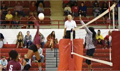  ?? Staff photo by Josh Richert ?? ■ Arkansas High’s Z’niyah Nelson spikes the ball against J.A. Fair during a 6A/5A conference volleyball match Thursday at Razorback Gym on Senior Night. The Lady Backs swept the Lady War Eagles, 25-12, 25-10, 25-15.