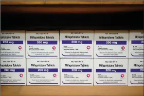  ?? (File Photo/AP/Allen G. Breed) ?? Boxes of the drug mifepristo­ne line a shelf March 16 at the West Alabama Women’s Center in Tuscaloosa, Ala. The drug is one of two used together in “medication abortions.” Stories circulatin­g online incorrectl­y claim medication abortions are dangerous.