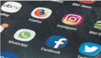  ?? OLI SCARFF/AFP/GETTY IMAGES FILE PHOTO ?? Tech giants including Apple, Twitter and Airbnb are sending users updated privacy prompts ahead of May 25.