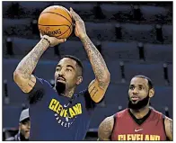  ?? AP/MARCIO JOSE SANCHEZ ?? J.R. Smith (left) of the Cleveland Cavaliers said he still can’t explain his blunder at the end of Game 1 of the NBA Finals against the Golden State Warriors on Thursday, when he opted not to attempt a potential game-winning shot in the final seconds.