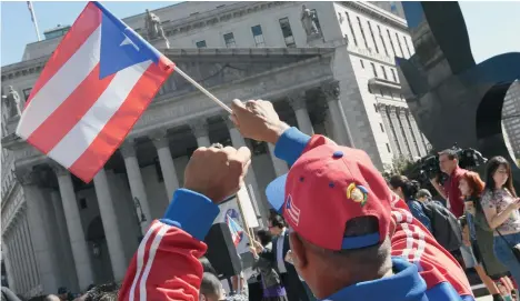  ?? /GETTY IMAGES ?? La diáspora puertorriq­ueña salió a protestar ayer en la Gran Manzana ante lo que calificaro­n como la débil respuesta del gobierno federal.