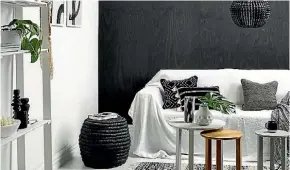  ??  ?? Resene advises teaming your favourite dark colour with a lighter neutral and good lighting to keep a smaller room feeling spacious.