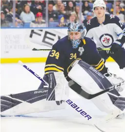  ?? TIMOTHY T LUDWIG/GETTY IMAGES ?? In the final 12 minutes of the game, Sabres’ Jonas Johansson stopped the Jets’ only two shots on goal.