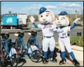  ?? ?? Mr. and Mrs. Met welcome Citi Bike docks at Citi Field.