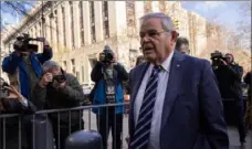  ?? Yuki Iwamura/Bloomberg ?? Sen. Robert Menendez, D-N.J., arrives at federal court Monday in New York. Mr. Menendez pleaded not guilty to new obstructio­n charges in his Manhattan bribery case.