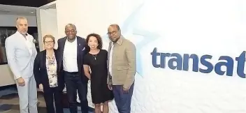  ??  ?? Jamaica’s minister of tourism, Edmund Bartlett (right), shares lens time with (from left) Philip Rose, the Jamaica Tourist Board’s regional director for Canada; Brenda McInerney, product director, Transat; Donovan White, director of tourism; and Renée Boisvert, vice-president of products, Transat.