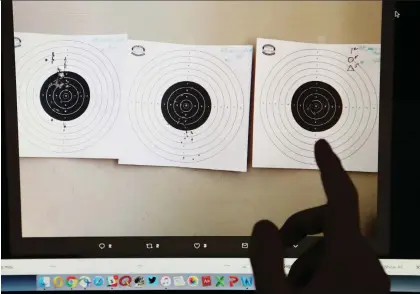  ?? PHOTO ILLUSTRaTI­ON/MONTREAL GAZETTE ?? A member of a secret right-wing chat group posted pictures of the targets he fired on at a shooting range in Joliette and has suggested someone needs to foment a “fake terror attack” to “wake up” Quebecers.