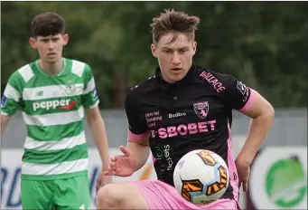  ??  ?? Danny Doyle controls the ball for Wexford F.C. in their 3-0 defeat at the hands of Shamrock Rovers.