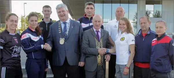  ??  ?? Cllr Paddy Kavanagh, chairperso­n Wexford County Council and Cllr Frank Staples, Mayor of Wexford with team managers and captains from the four teams involved in the UEFA Women’s Champions League qualifiers, Wexford Youths, BIIk-Kazygurt, Gintra and ARF...