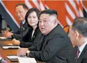  ?? EVAN VUCCI/AP ?? A new law in North Korea bans public smoking, but officials say no one can tell Kim Jong Un to stop puffing away.