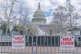  ?? AP PHOTO/J. SCOTT APPLEWHITE ?? The Capitol is seen Jan. 17, 2021, during security preparatio­ns ahead of the inaugurati­on of President-elect Joe Biden and Vice President-elect Kamala Harris in Washington.