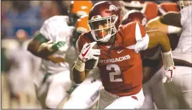 ?? NWA Democrat-Gazette/BEN GOFF ?? Arkansas running back Chase Hayden carries the ball during the fourth quarter of Thursday’s victory in Little Rock.