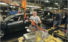  ??  ?? Both CAW and UAW workers will be affected in Ford’s overhaul.