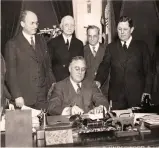  ??  ?? 1934 US President Franklin D Roosevelt signs the Gold Reserve Act. This file photo shows Roosevelt signing the Act