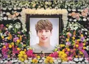  ?? Choi Hyuk AFP/Getty Images ?? THE SUICIDE of K-pop star Jonghyum in 2017 brought to light mental health issues in the genre.