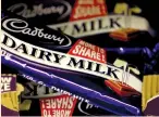  ?? (Alessia Pierdomeni­co/Reuters) ?? CADBURY CHOCOLATE bars are seen in a shop in London.