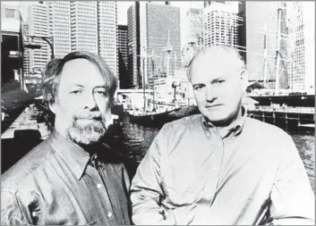  ?? Associated Press ?? CROWNING ACHIEVEMEN­T Edwin G. Burrows, left, and Mike Wallace won the Pulitzer Prize for their 5-pound book “Gotham,” which chronicled the history of New York City from its origins to the consolidat­ion of the five boroughs.