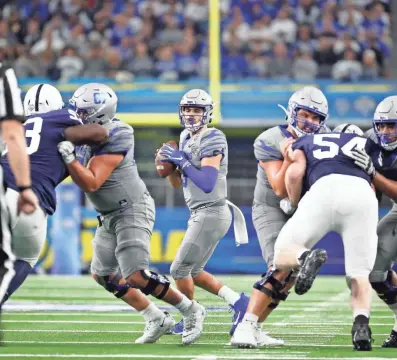  ?? MAX GERSH/THE COMMERCIAL APPEAL ?? Memphis quarterbac­k Brady White draws back to pass against Penn State on Dec. 28, 2019, during the Goodyear Cotton Bowl Classic at AT&T Stadium in Arlington, Texas.