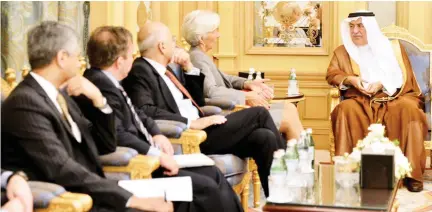  ??  ?? Minister of Finance Ibrahim Al-Assaf with the Internatio­nal Monetary Fund Managing Director Christine Lagarde and other officials in Riyadh on Wednesday. (SPA)