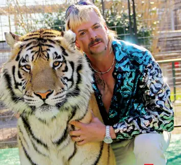  ??  ?? The Netflix mega-hit Tiger King stars Joe Exotic, a self-described “gay cowboy” big-cat breeder. The seven-part documentar­y captivated millions homebound by the pandemic. A Show of a Different Stripe