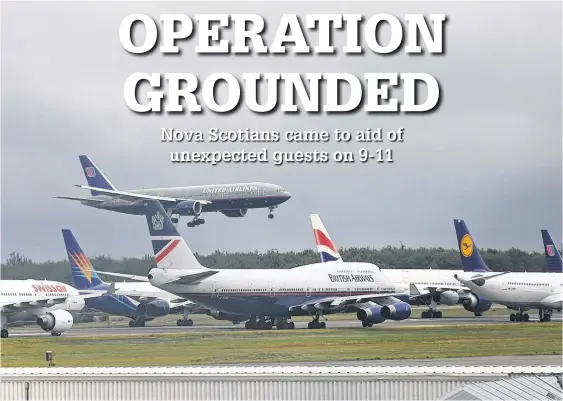  ?? TIM KROCHAK • THE CHRONICLE HERALD ?? Forty internatio­nal passenger airlines were diverted to Halifax Stanfield Internatio­nal Airport after airspace was closed following the 9-11 attacks in the United States on Sept. 11, 2001.