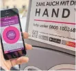  ?? FOTO: DPA ?? Auch in Lindau können Autofahrer Kosten fürs Parken mit der App EasyPark zahlen.