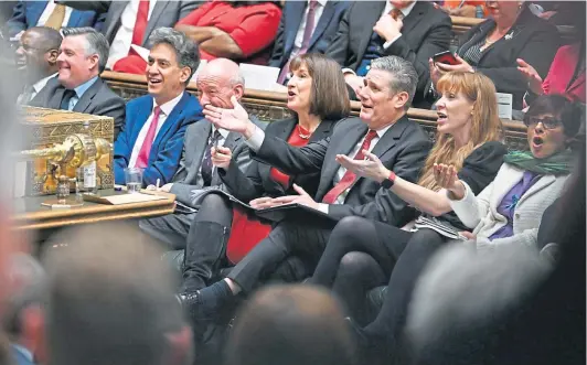  ?? ?? BATTLE LINE: Labour frontbench­ers react to Chancellor Jeremy Hunt’s Autumn Statement announcing tax rises and spending cuts.