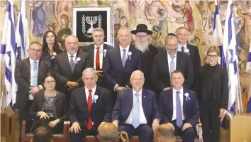  ?? (Marc Israel Sellem/The Jerusalem Post) ?? LEADERS OF the parties meet with President Reuven Rivlin last month – divvying up the ministries?