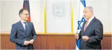  ?? FOTO: FLORIAN GÄRTNER/DPA ?? Benjamin Netanjahu, Ministerpr­äsident von Israel (re.), betont im Gespräch mit Außenminis­ter Heiko Maas (SPD), man werde keine israelisch­en Siedlungen räumen.