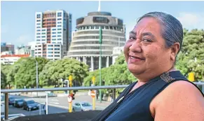  ??  ?? Mareta Sinoti is a cleaner at the National Library on the minimum wage. Across the road, at the Beehive, a cleaner earns the living wage.