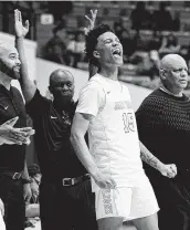 ?? Eric Christian Smith / Contributo­r ?? Yates guard Rubin Jones reacts after another Lions 3-pointer during the second half Saturday during the Class 4A Region III championsh­p game.